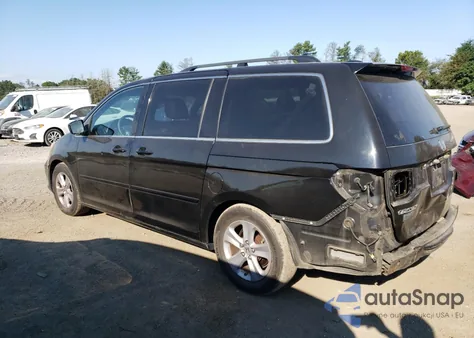 2010 Honda Odyssey Touring z USA, uszkodzony, nr VIN 5FNRL3H91AB091110